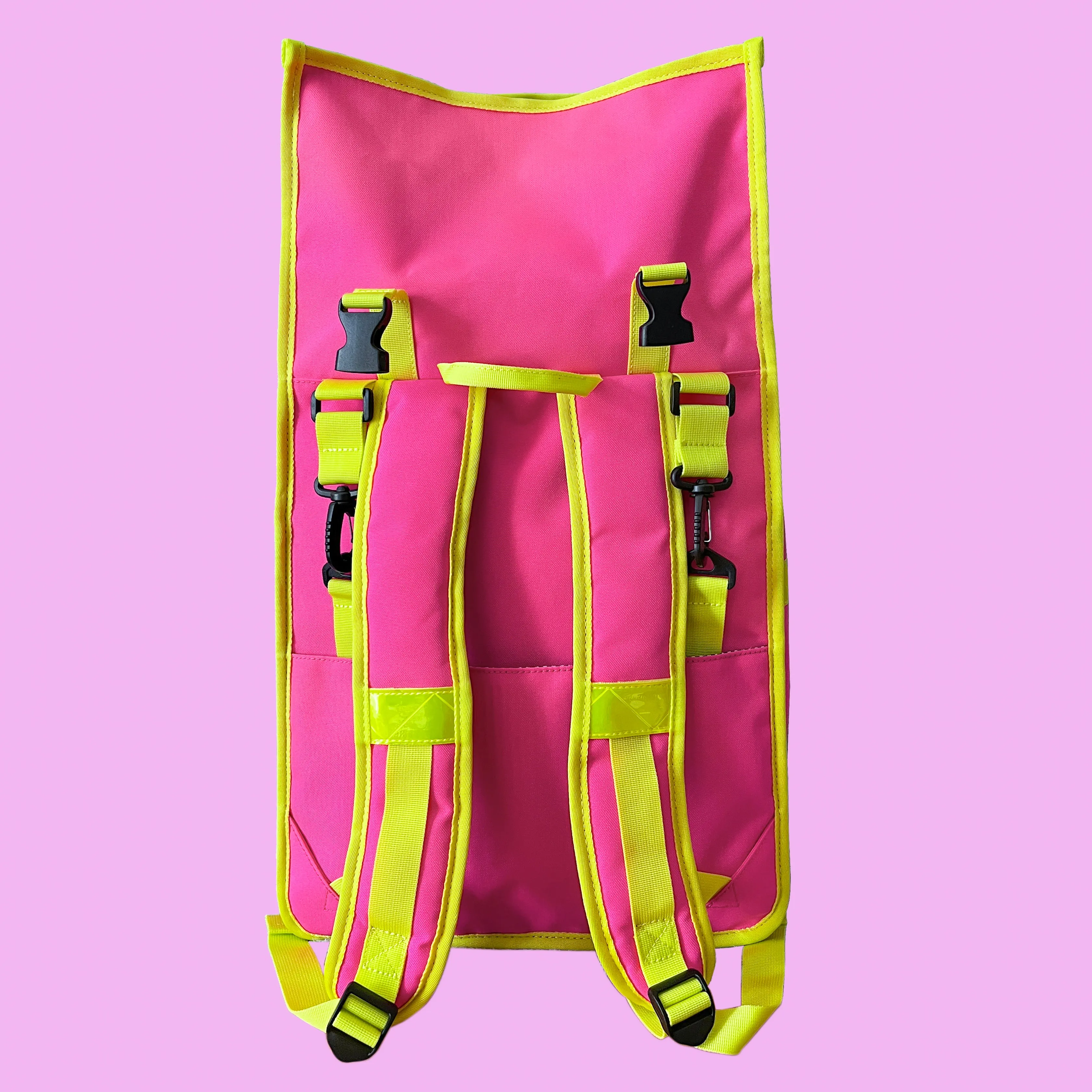 Neon pink rolltop backpack pannier bike bag Rixen kaul hardware hooks